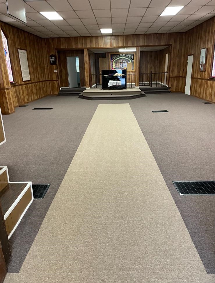 Carpet installed in church with nuanced colors